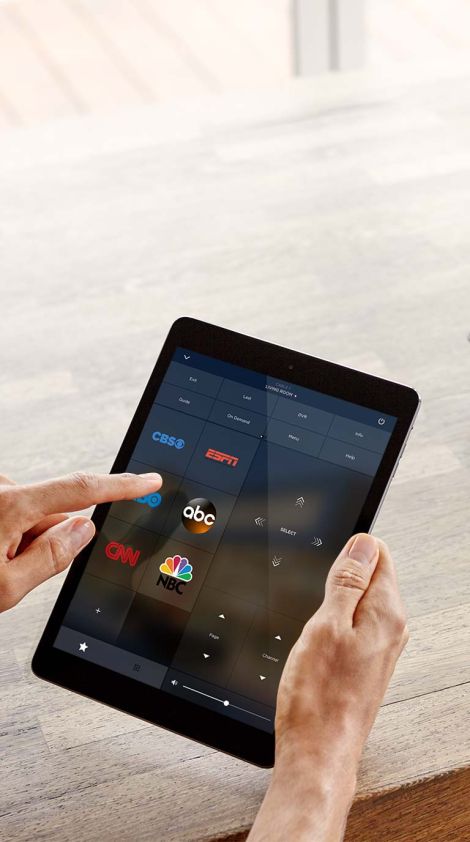 person using ipad with savant interface