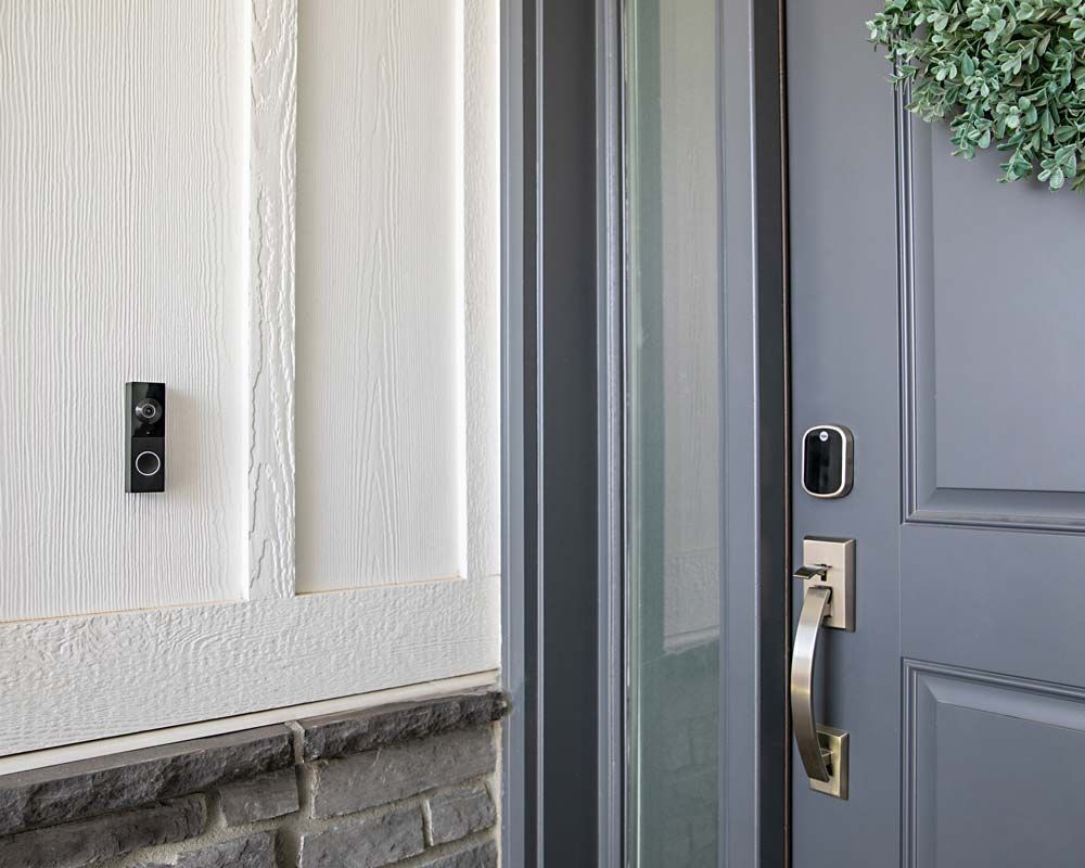 Blue and grey front door with Control4 chime doorbell